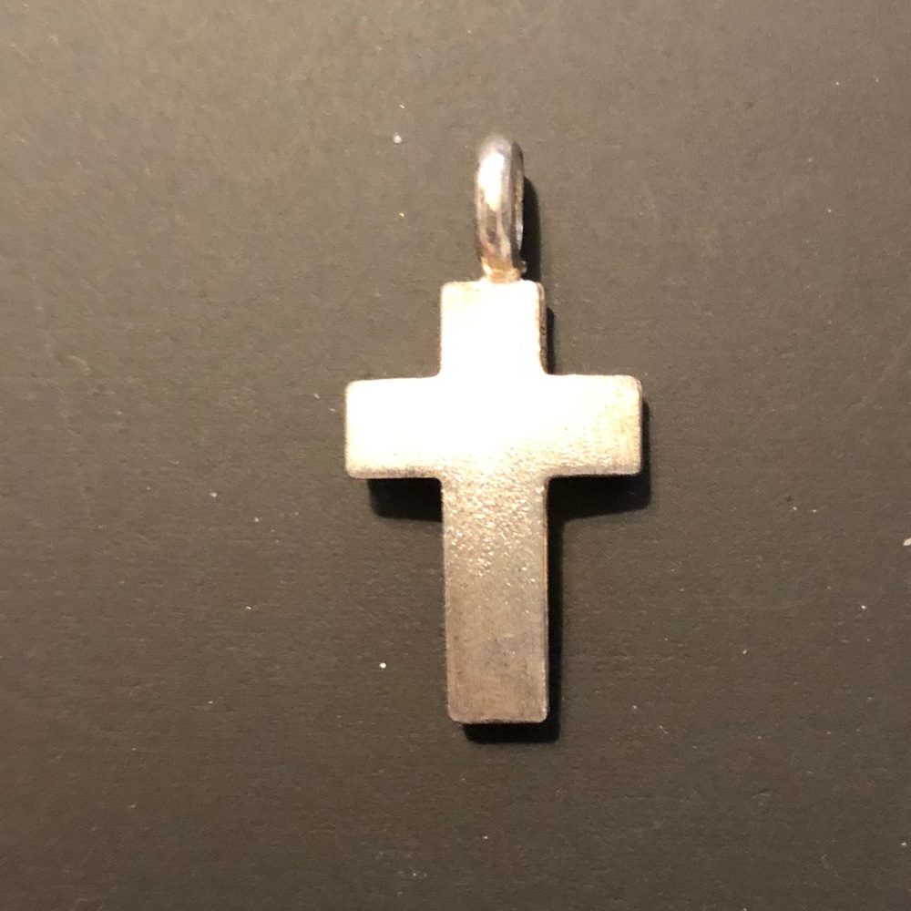 Sterling silver cross pendant.